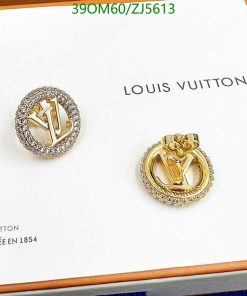 Louis Vuitton logo earrings with diamonds on display.