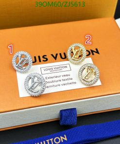 Luxury branded cufflinks on designer packaging.