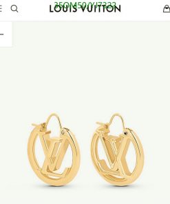 Gold hoop earrings with designer logo.