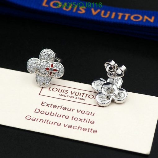 Louis Vuitton flower earrings on brand label.