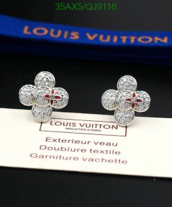 Louis Vuitton diamond flower earrings on display.