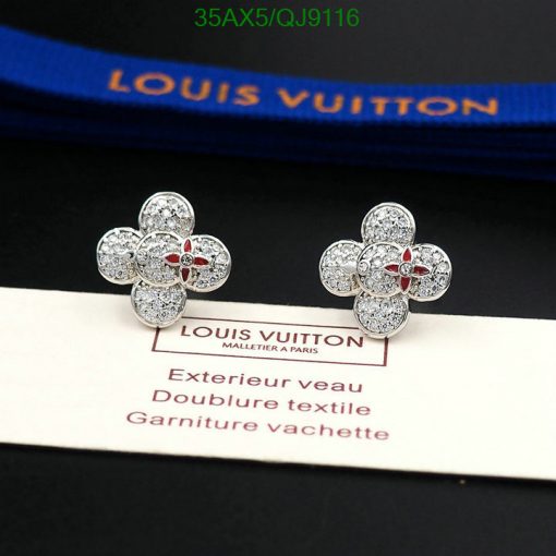 Louis Vuitton diamond flower earrings on display.