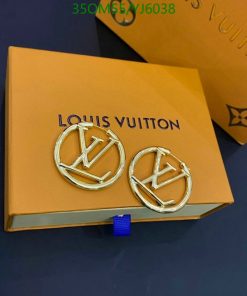 Louis Vuitton earrings on branded box.