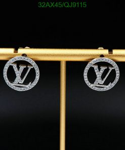 Designer logo cufflinks with diamonds.