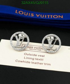 Designer logo earrings with diamonds on display card.