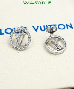 Louis Vuitton logo earrings on fabric