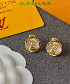 Designer gold-toned logo earrings with packaging.