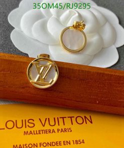 Louis Vuitton jewelry display with logo and ring