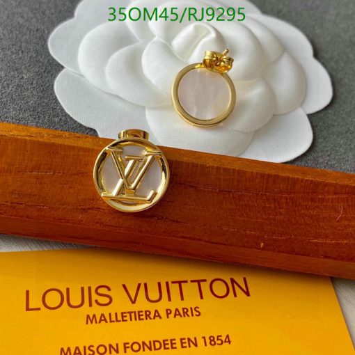 Louis Vuitton jewelry display with logo and ring