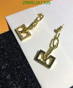 Gold designer logo earrings with rhinestones.