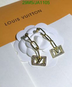 Designer earrings on branded card.