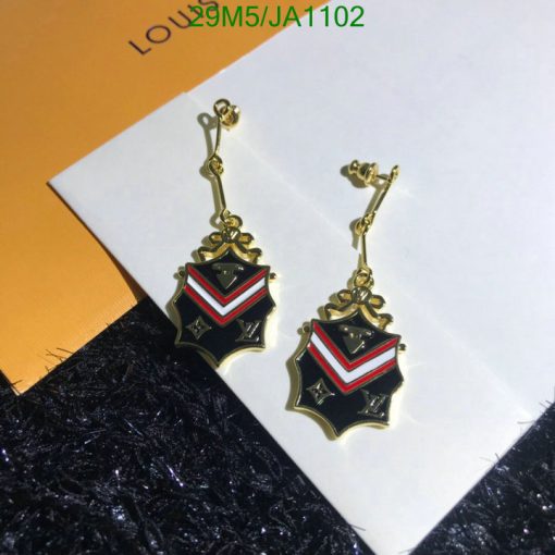 Gold and black designer star-shaped earrings.