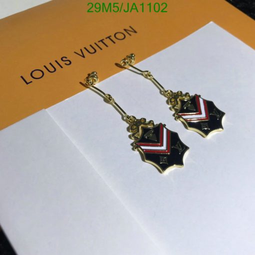 Designer brand dangle earrings on envelope.