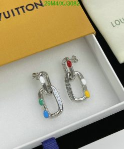 Designer carabiner-shaped earrings with colorful accents.