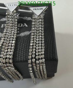 Prada earrings with crystals on branded box.