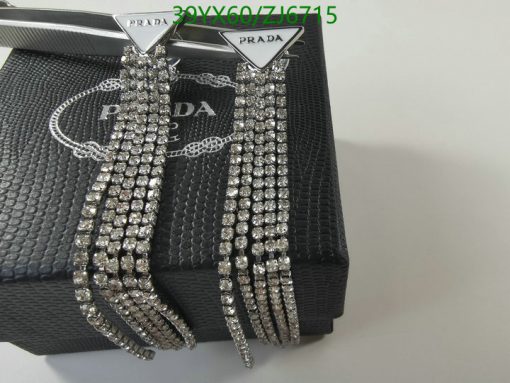 Prada earrings with crystals on branded box.