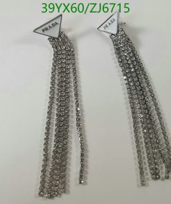 Silver chain fringe earrings with label.