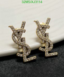 Gold diamond-studded dollar sign earrings.