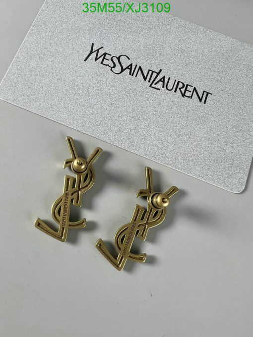 Designer logo earrings on white background.