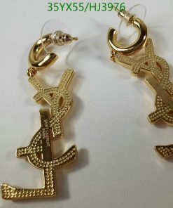 Gold anchor-shaped earrings with pavé accents