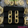 Gold numeral cake decorations on black background.