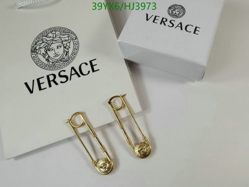 Versace earrings with medusa logo and packaging.