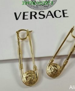 Versace gold safety pin earrings.