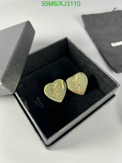 Gold heart-shaped earrings in black box.