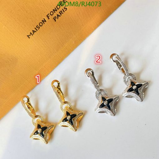 Gold and silver star-shaped pendant earrings