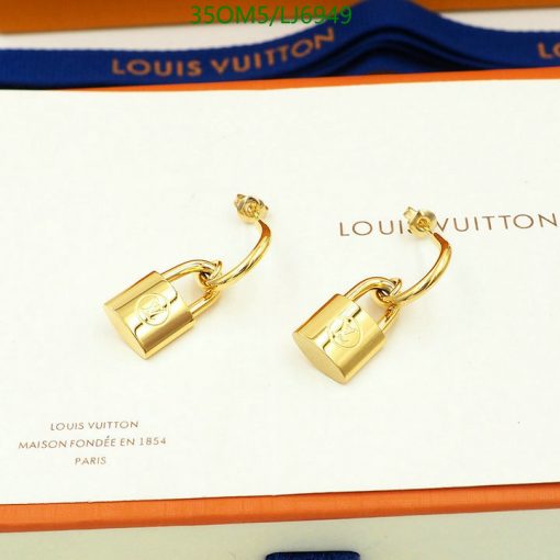 Gold padlock earrings on branded packaging.