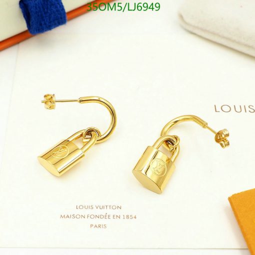 Gold padlock earrings on white background