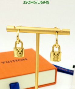 Gold padlock earrings on display with branded box.