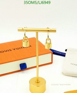 Gold padlock earrings display with branded packaging.