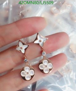 Star and flower dangle earrings with gems.