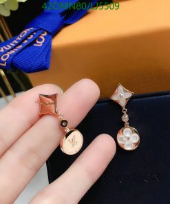 Rose gold designer logo earrings with pearls.