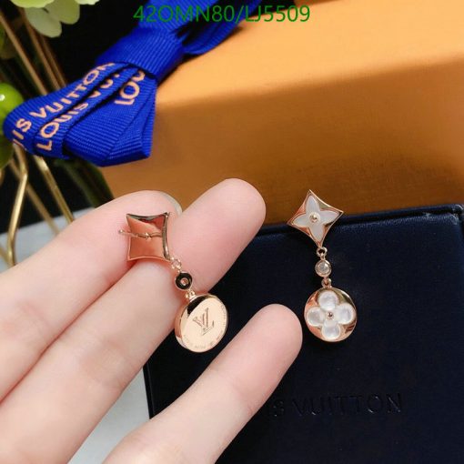 Rose gold designer logo earrings with pearls.