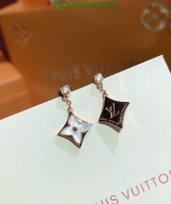 Designer star and logo pendant earrings.