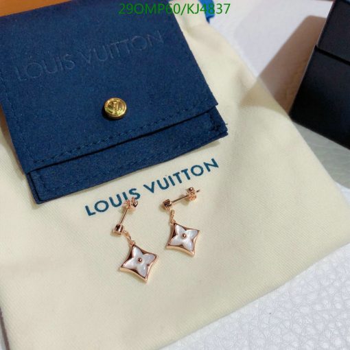 Designer star-shaped earrings with brand pouch.