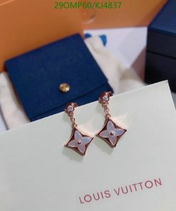 Louis Vuitton star-shaped earrings on display.