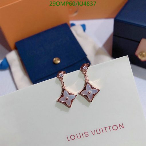 Louis Vuitton star-shaped earrings on display.