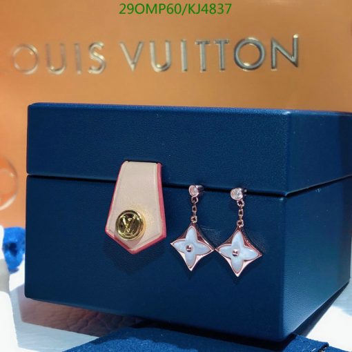 Designer earrings on Louis Vuitton box.