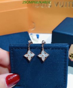 Designer star-shaped earrings on display.