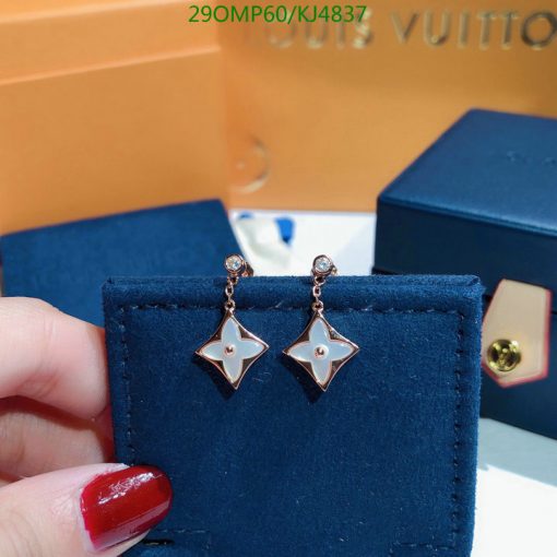 Designer star-shaped earrings on display.