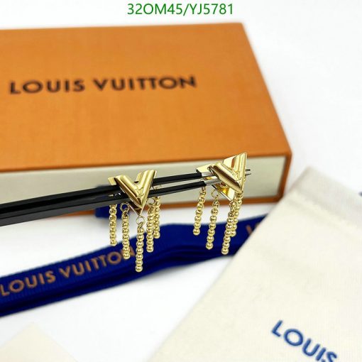 Louis Vuitton branded hair clips on packaging.