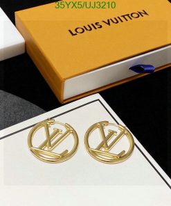 Designer brand earrings with packaging.