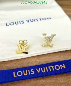 Designer brand cufflinks and label close-up.