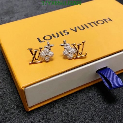 Louis Vuitton earrings on branded box.