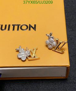 Designer earrings on branded packaging.