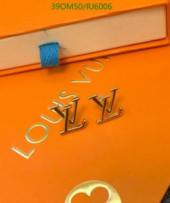 Orange luxury brand packaging with gold lettering.