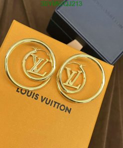 Gold designer logo earrings on branded packaging.